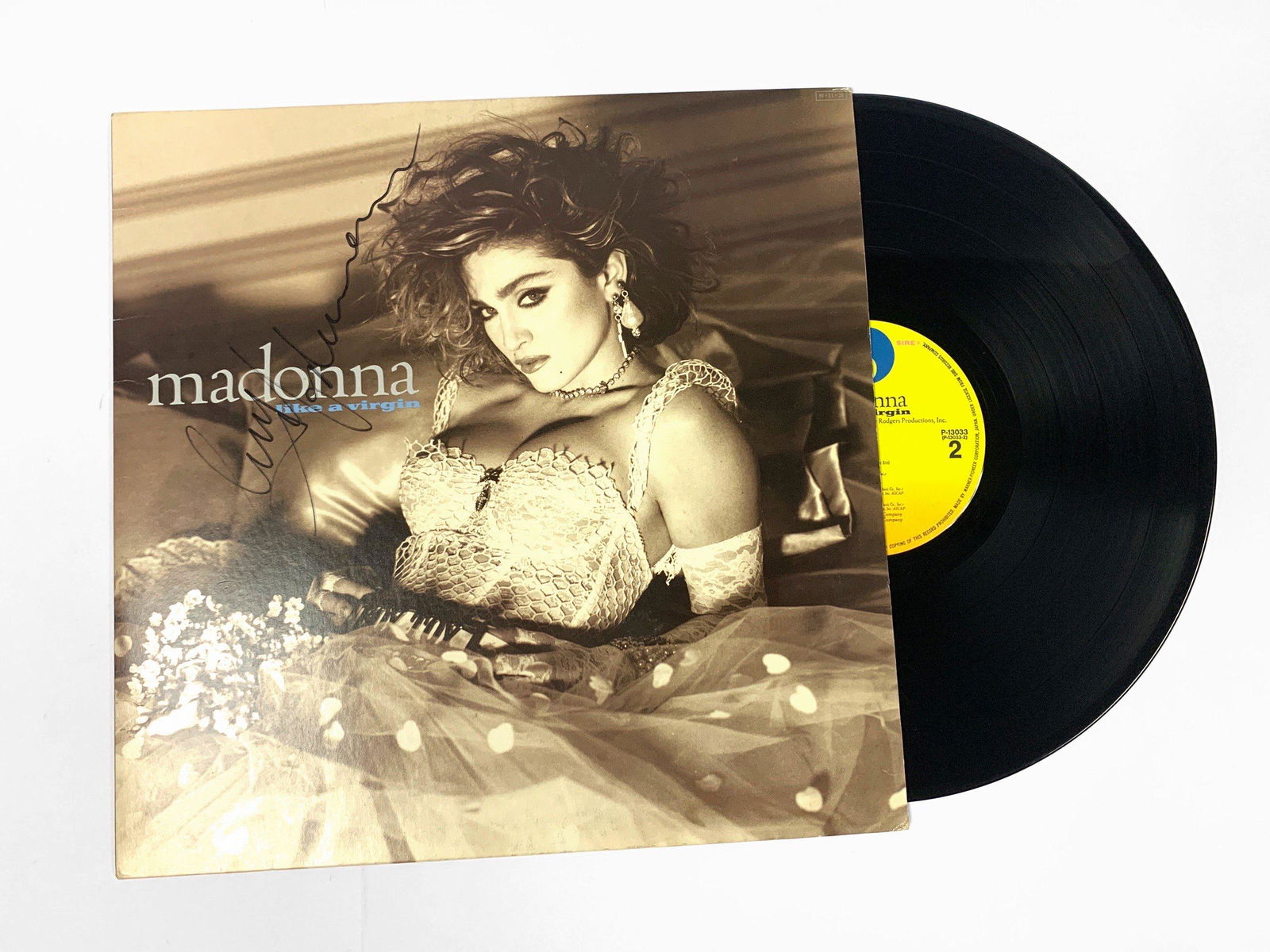 Autographed Madonna Like A Virgin Vinyl: Autographed by:MadonnaItem is in Excellent Condition and Certified.