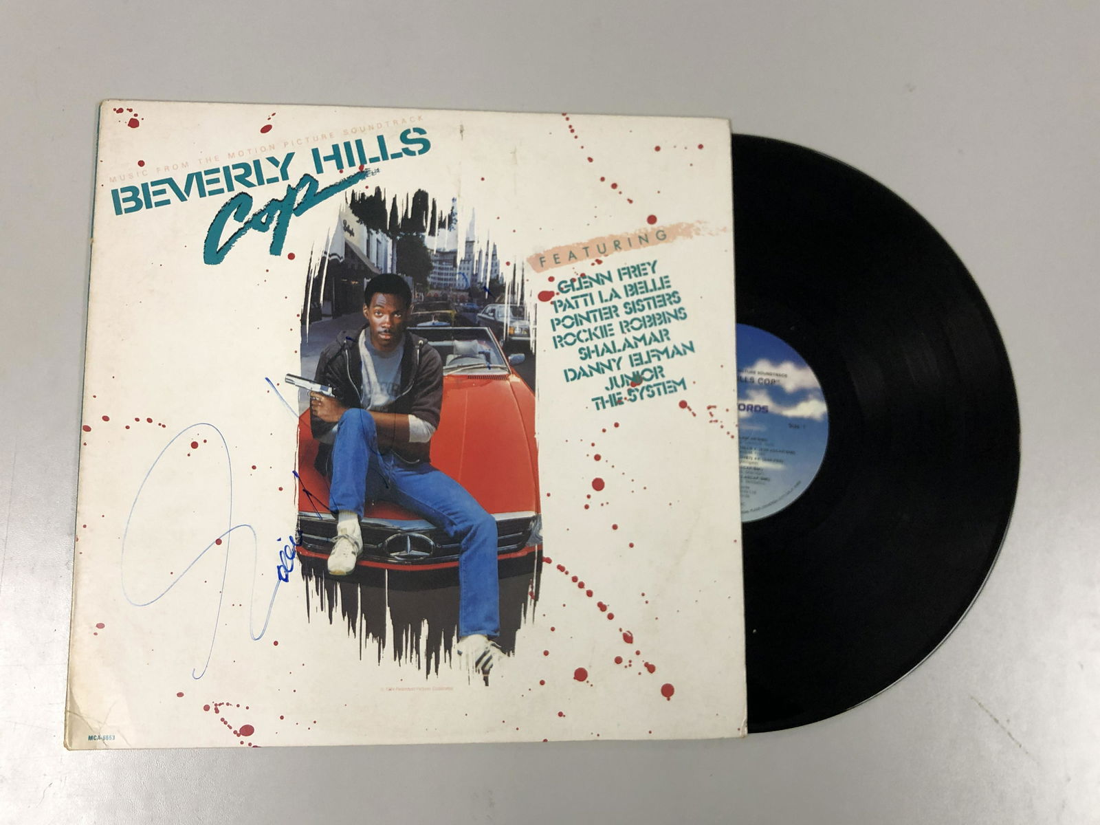 Autograph Signed Beverly Hills Cop Vinyl: Autograph Includes: Eddie MurphyItem is in great condition with no damage, unframedItem is being vertified. Please review our Terms and Conditions before bidding, all sales are final. Welcome for any
