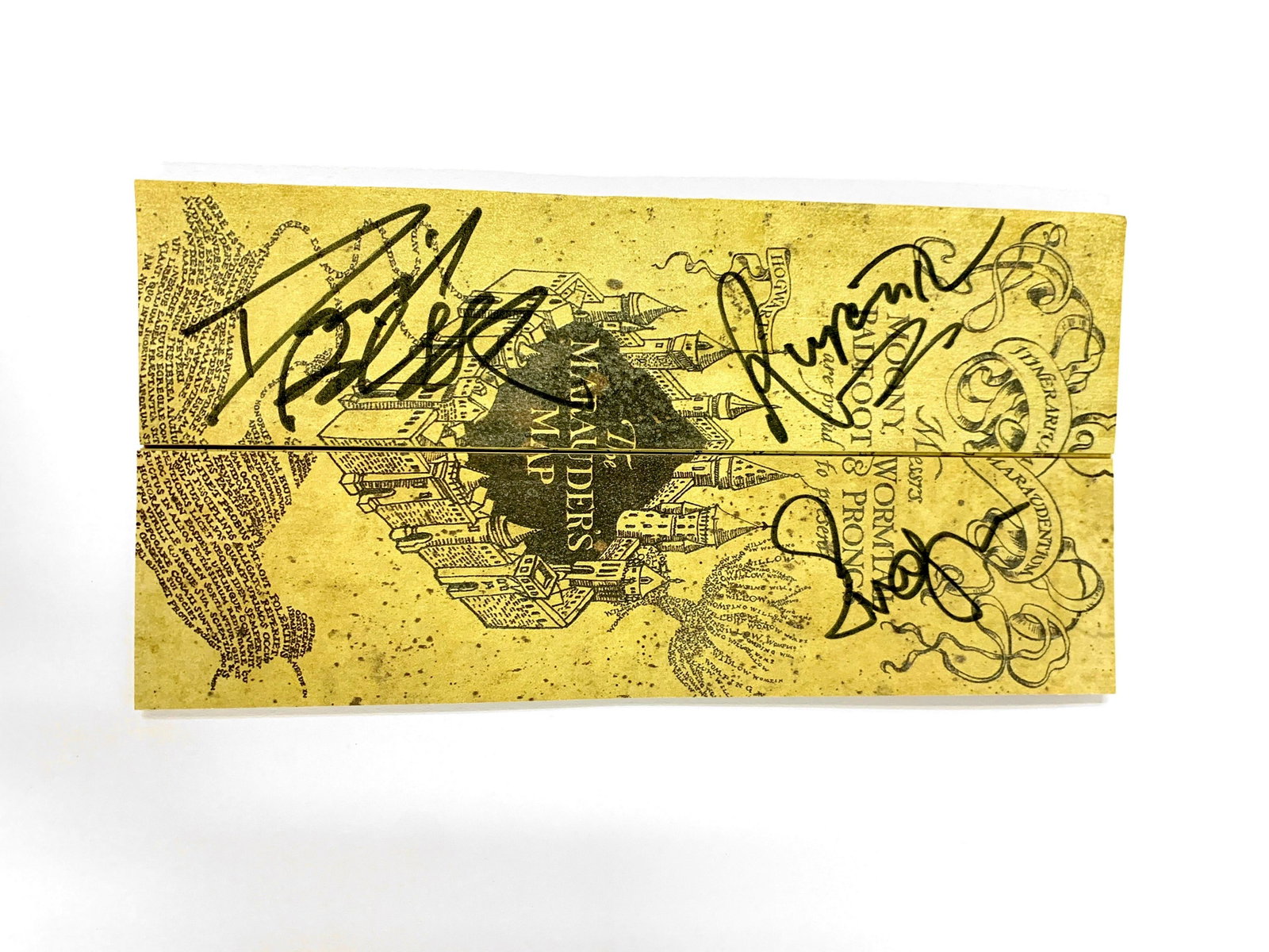 Autograph Signed Harry Potter Map Toy: Autograph By: Daniel Radcliffe, Emma Watson, Rupert GrintExcellent Condition and Certified