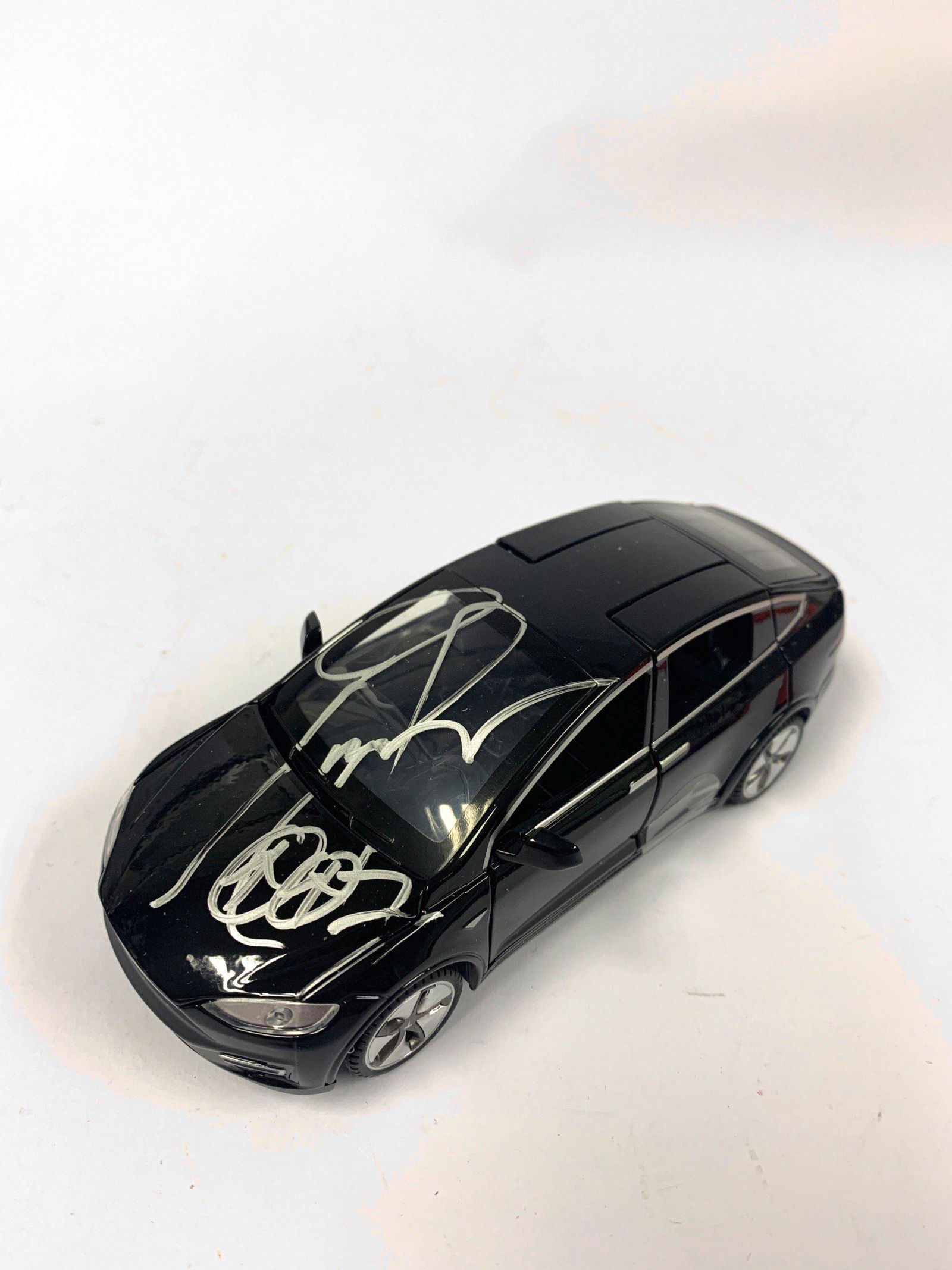 Autograph Signed Pierce Brosnan Toy Car (1 of 1)