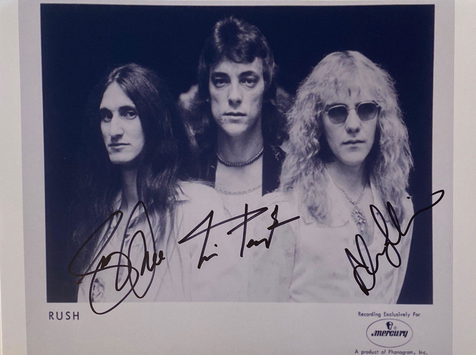 Autograph Signed Rush Photo (1 of 1)