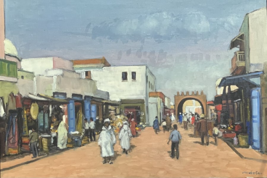 Market street in Monastir Tunisia: A 20th century, oil on canvas painting of a market street in Monastir Tunisia. The painting is signed on the bottom right by Mickey. The painting is 95 x 70 cm with frame and 85 by 60 cm without frame