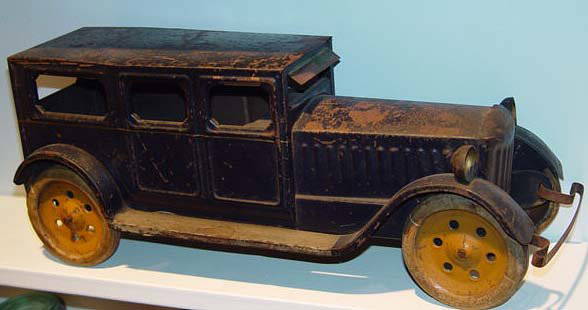 Schieble 18 inch Toy Limousine Dayton: The Schieble Toy & Novelty Company of Dayton Ohio produced toys fron 1909-1931. This largest of scale toy dates from the 1920's period. All four metal wheels have original Schielbe marked rubber 