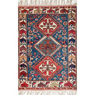 A Shiraz Khamseh rug: An antique three medallion design Shiraz Khamseh rug (Persia) restored with new fringes. Circa 1900. Approx. Dim: 120 x 84cm 