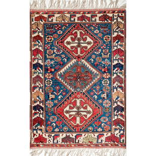 A Shiraz Khamseh rug: An antique three medallion design Shiraz Khamseh rug (Persia) restored with new fringes. Circa 1900. Approx. Dim: 120 x 84cm 