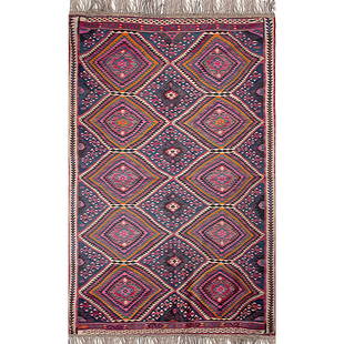 A Zakho Kilim Carpet: An early 20th century Zakho Kilim (Kurdistan - Iraq), red color, wool on wool. Circa 1900. Approx. Dim: 223 x 137cm 