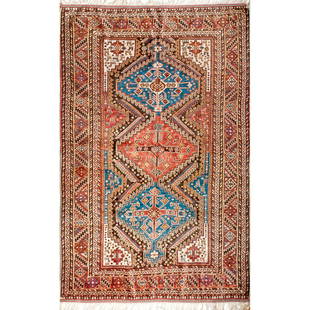 A Qashqai Rug: A very fine high quality Qashqai rug (Persia) multi medallion design with unusual borders in very good condition, wool on wool. Circa 1890. Approx. Dim: 232 x 145cm 