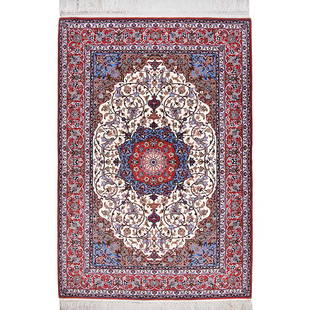 An Isfahan Carpet: A 20th century Isfahan (Persia) wool on silk carpet medallion design. Approx. 165x113cm 