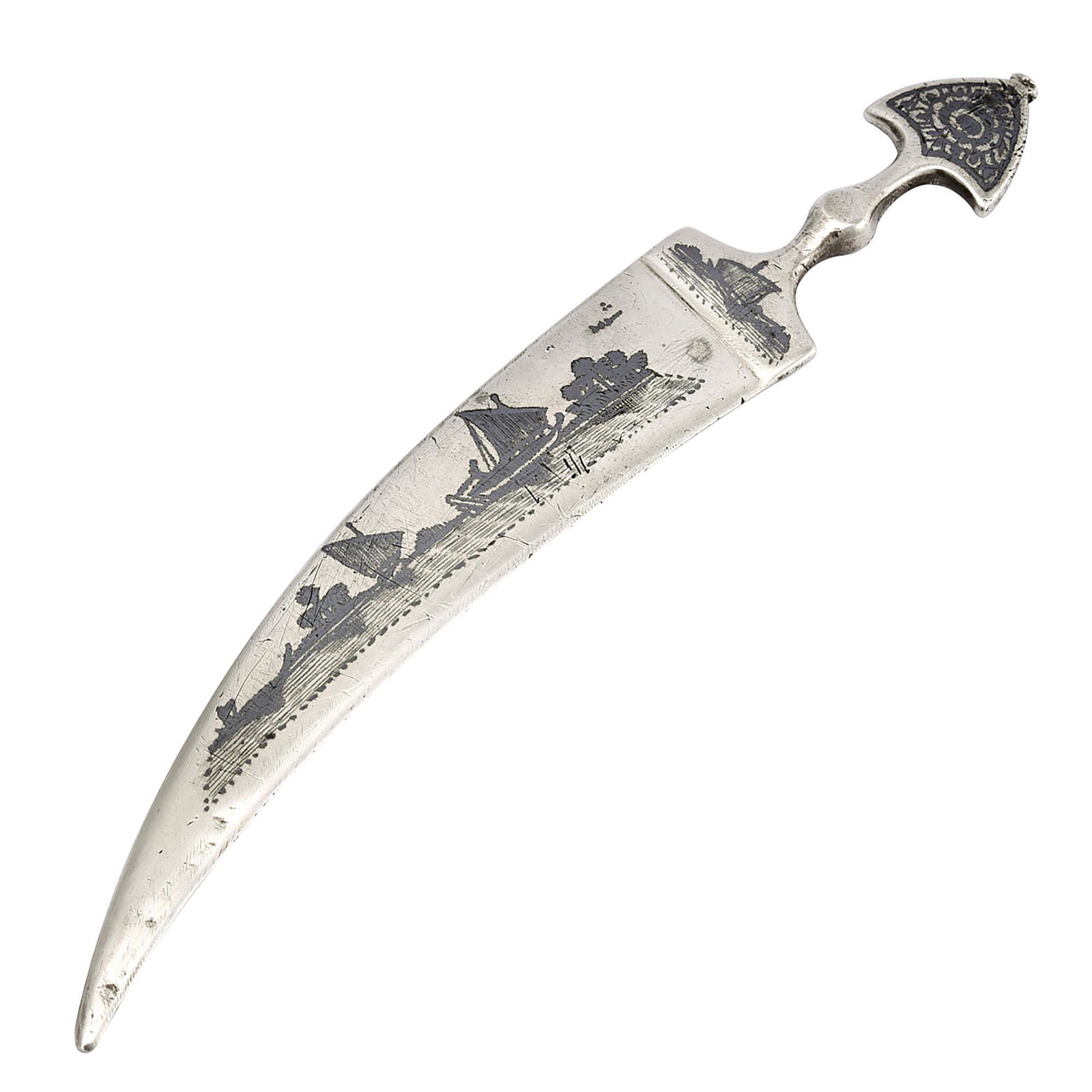 An Iraqi niello silver envelope opener in a shape of dagger: An early 20th century Iraqi niello silver envelope opener in a shape of dagger. Signed (Shdood). Circa 1930. Approx. W: 26g L: 14cm W: 2cm 