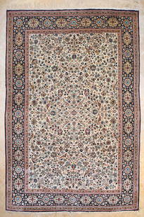 Qum Carpet: A semi antique silk Qum carpet of beige and floral designs. Approx. 162x107cm 