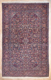 Kashan Wool Carpet.: A Kashan wool carpet of medallion and floral designs. Circa 1940. Approx. 215x129cm 