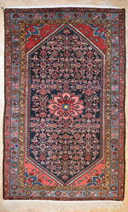 Inglas Wool Rug: An early 20th century Inglas wool rug. Approx. 162x99cm 