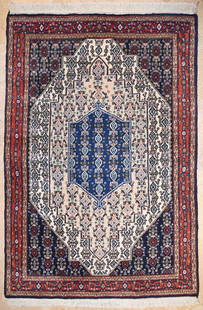 Senneh Rug: A Senneh rug classic angular Medallion design with ornaments on light base. 20th century. Approx. 180x127cm 