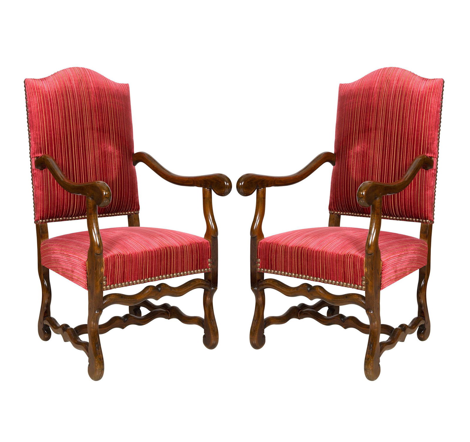 A pair of armchairs in the Louis XIII style.: A pair of armchairs in the Louis XIII style. Made of beech wood with curved armrests and turned legs connected on an H-shaped stretcher. The seats and arched top backs are newly reupholstered. Circa 1