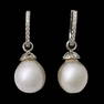 A pair of 18k white gold and diamond earrings with south sea pearls.