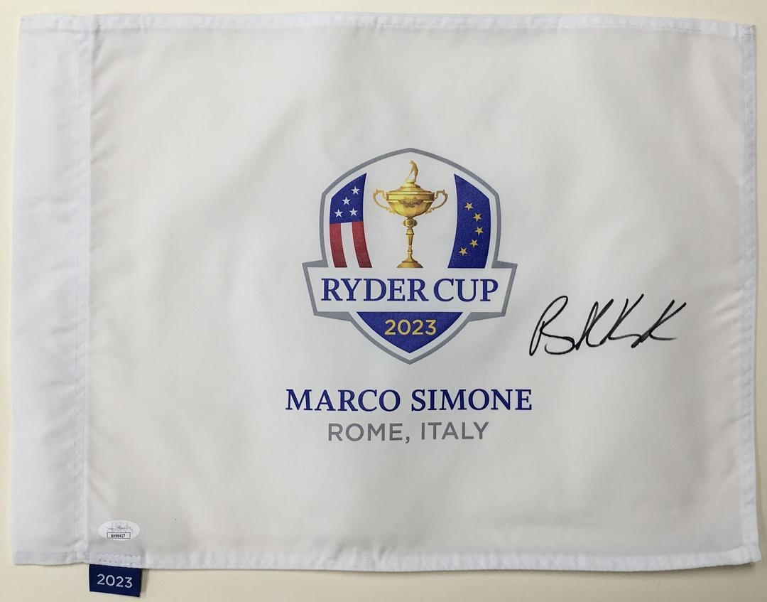 Brooks Koepka 2023 Ryder Cup Rome Italy Signed Pin Flag- JSA #AV66417: Brooks Koepka 2023 Ryder Cup Rome Italy Signed Pin Flag Authenticated by JSA Product Details: 2023 Ryder Cup Rome Italy Official pin flag signed perfectly by PGA st
