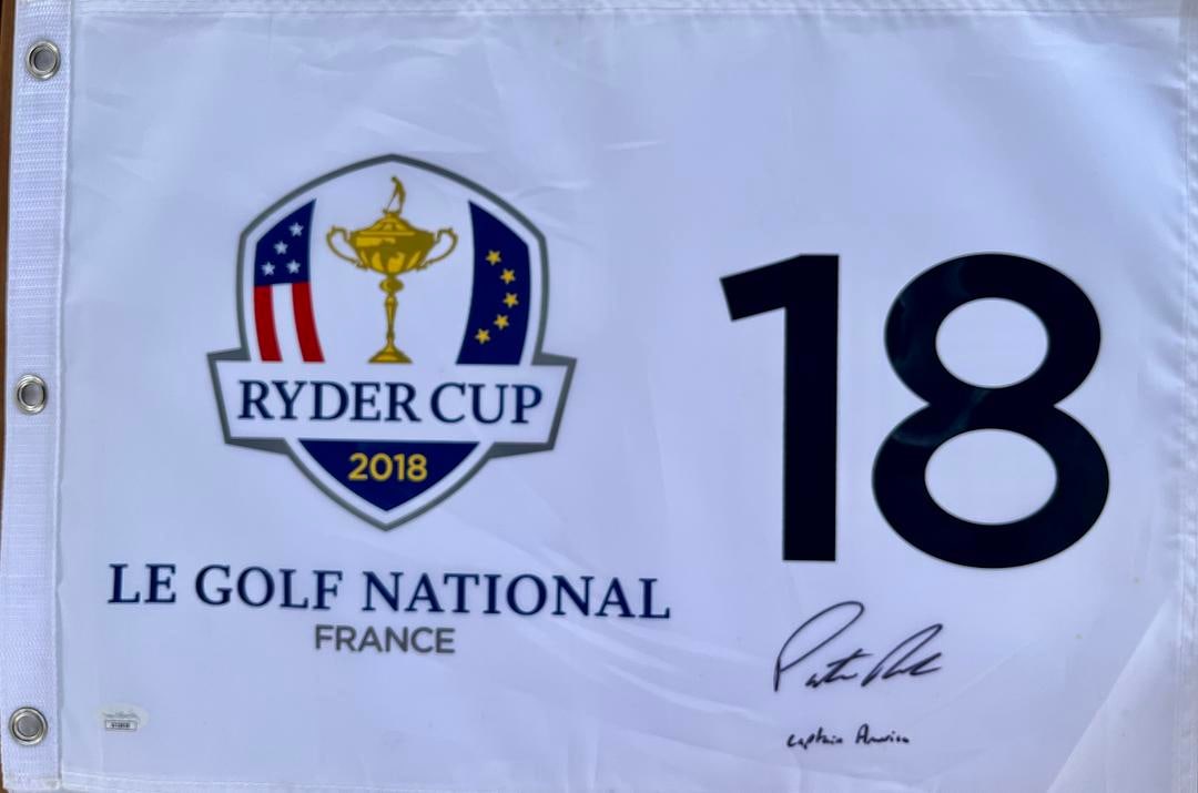 Patrick Reed signed "Captain America" 2018 Le Golf National Pin Flag-JSA AF18959: Official 2018 Ryder Cup Le Golf National France Pin Flag signed perfectly by PATRICK REED. Patrick has added the inscription "Captain America" to his signature. The flag is authenticated 