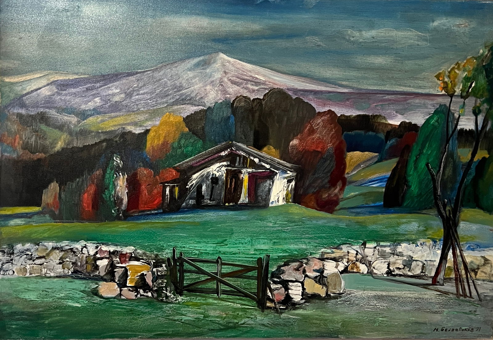 Mykhailo V. Bezpalkiv – House by the Hill: A serene pastoral landscape depicting a village with colorful autumn trees, and a snow capped mountain in the distance. Mykhailo V. Bezpalkiv’s bold color palette and simplified luminous forms