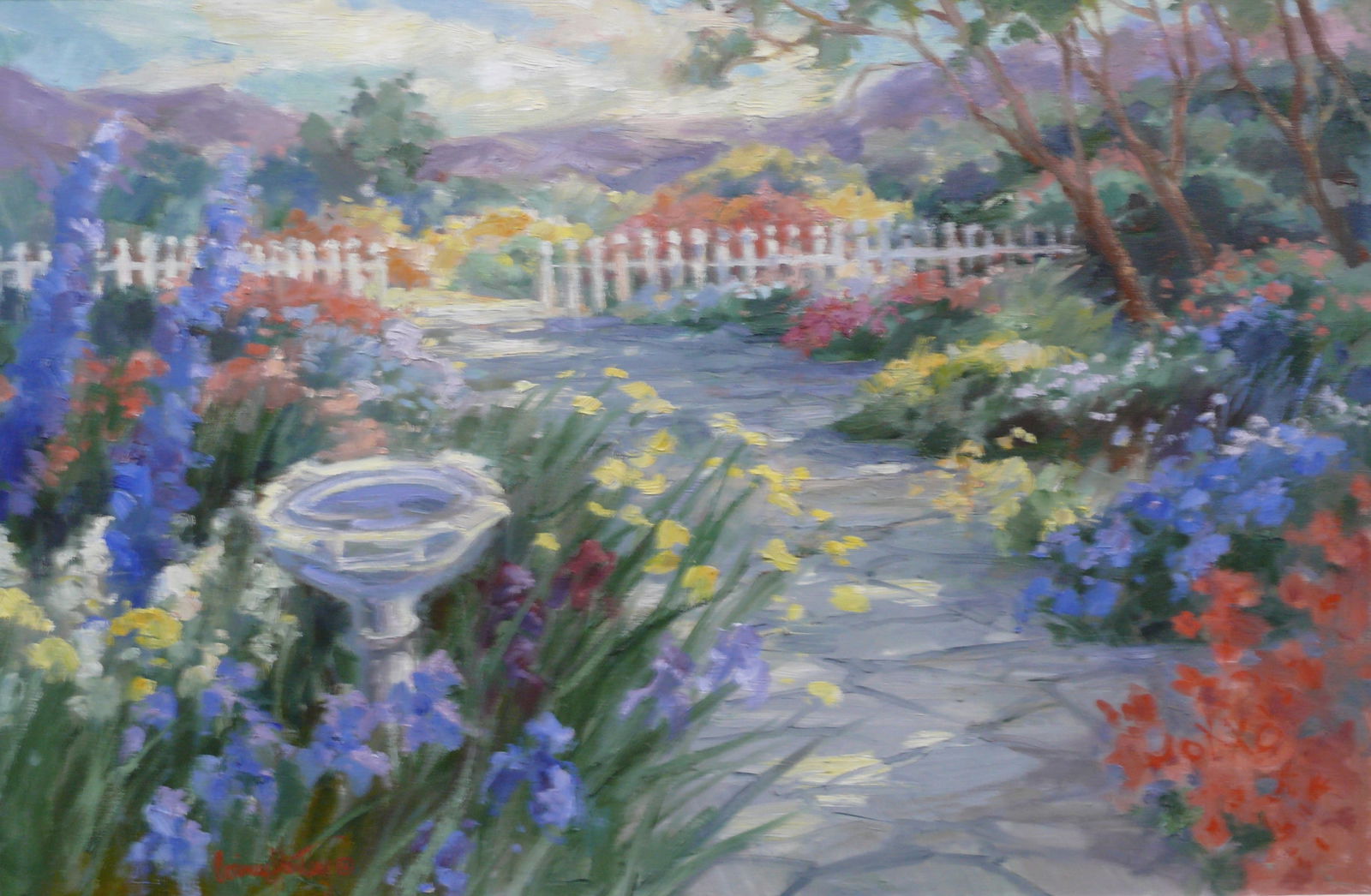 Corinne Hartley – Floral Garden Landscape With Mountains: Colorful garden scene filled with vivid flowers and a white picket fence, with distant mountains under soft sky tones. Known for her joyful palette, Hartley delivers a serene and inviting landscape