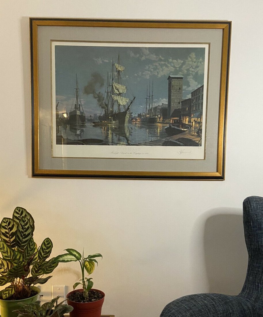 John Stobart "Cleveland Moonlight Arrival On The Cuyahoga ca. 1876", Signed: Limited edition print of John Stobart's "Cleveland Moonlight Arrival On The Cuyahoga ca. 1876." It is signed and numbered in pencil. Professionally framed.