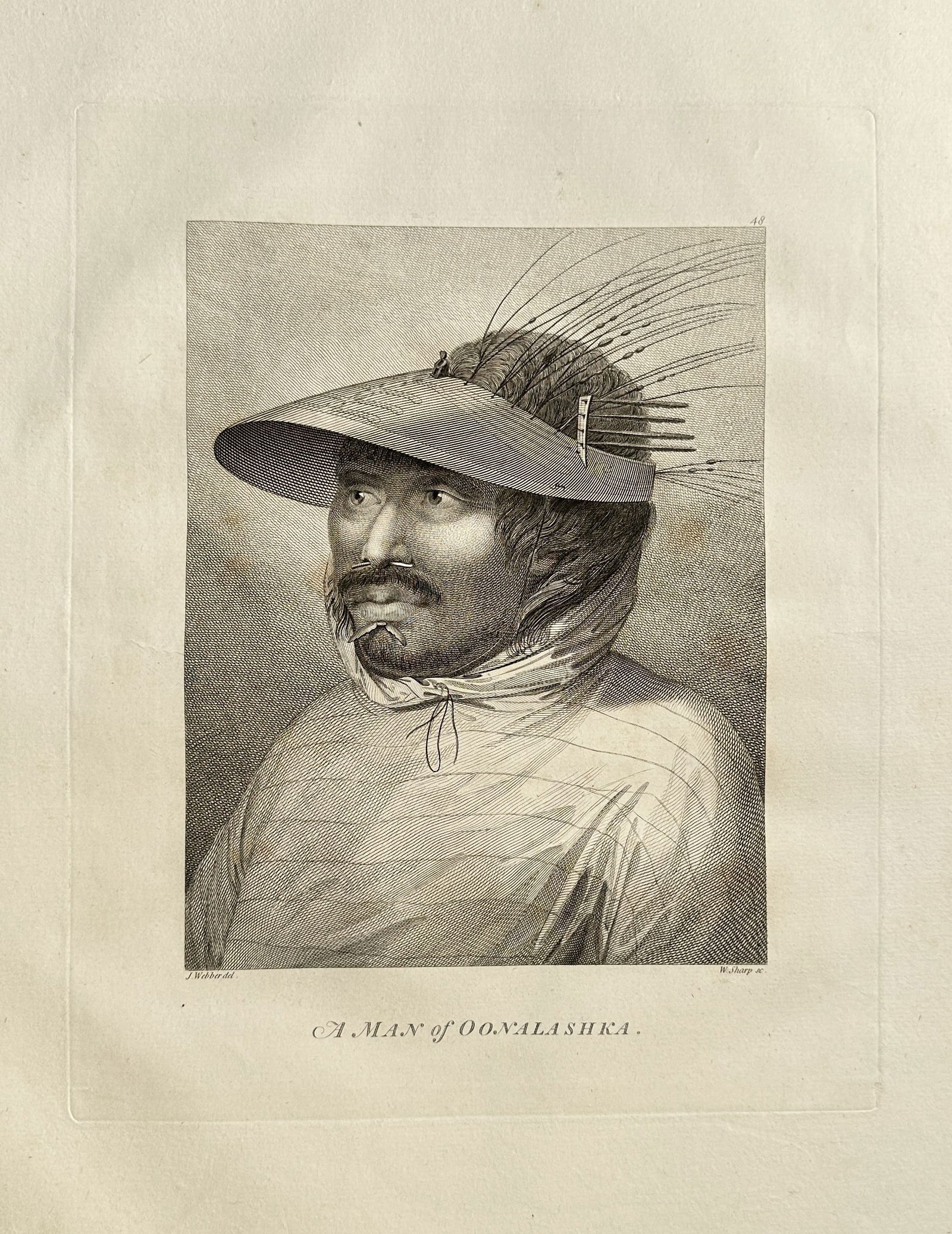 John Webber (1751–1793) – A Man of Oonalashka – Engraving (1784): This detailed engraving, titled A Man of Oonalashka, is an important ethnographic portrait depicting a male inhabitant of Unalaska Island in Alaska (North America). The subject is shown in traditional