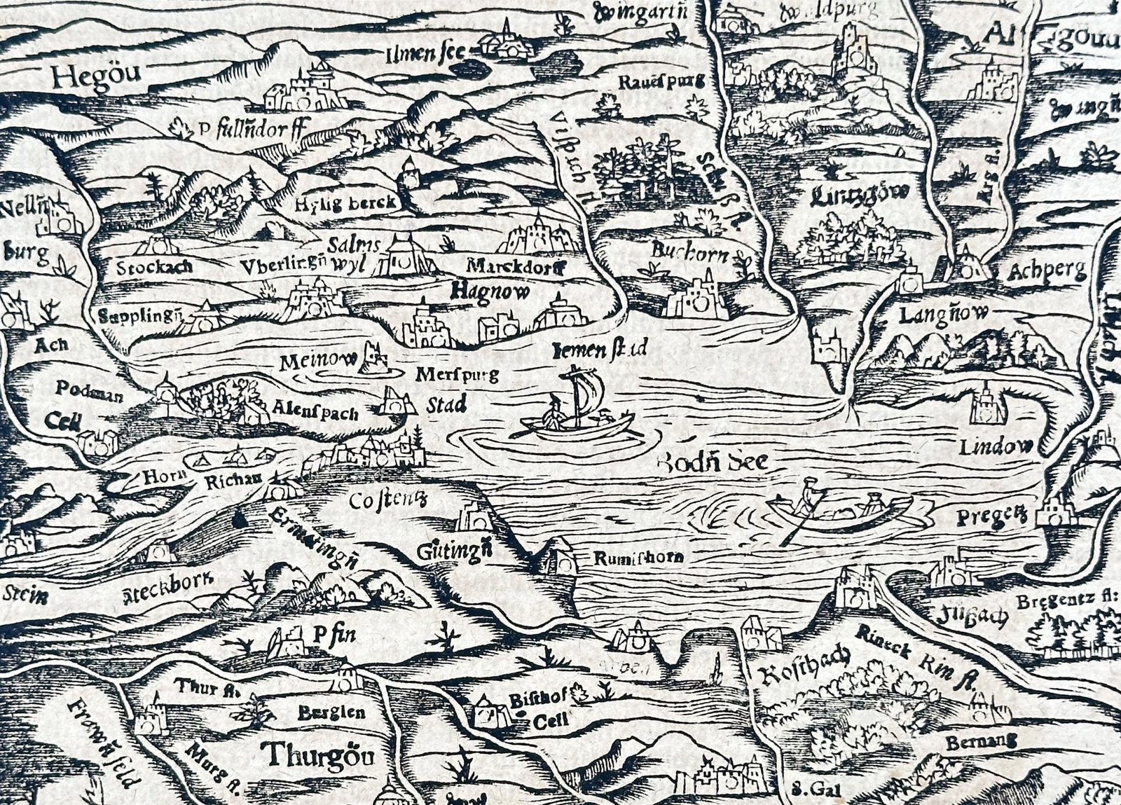 Sebastian Münster (1488–1552) – Map of Lake Constance (Bodensee, Germany): This woodcut map provides a geographical overview of Lake Constance ("Bodensee"), situated on the Rhine at the northern foot of the Alps, bordering Germany, Austria, and Switzerland. It details the la