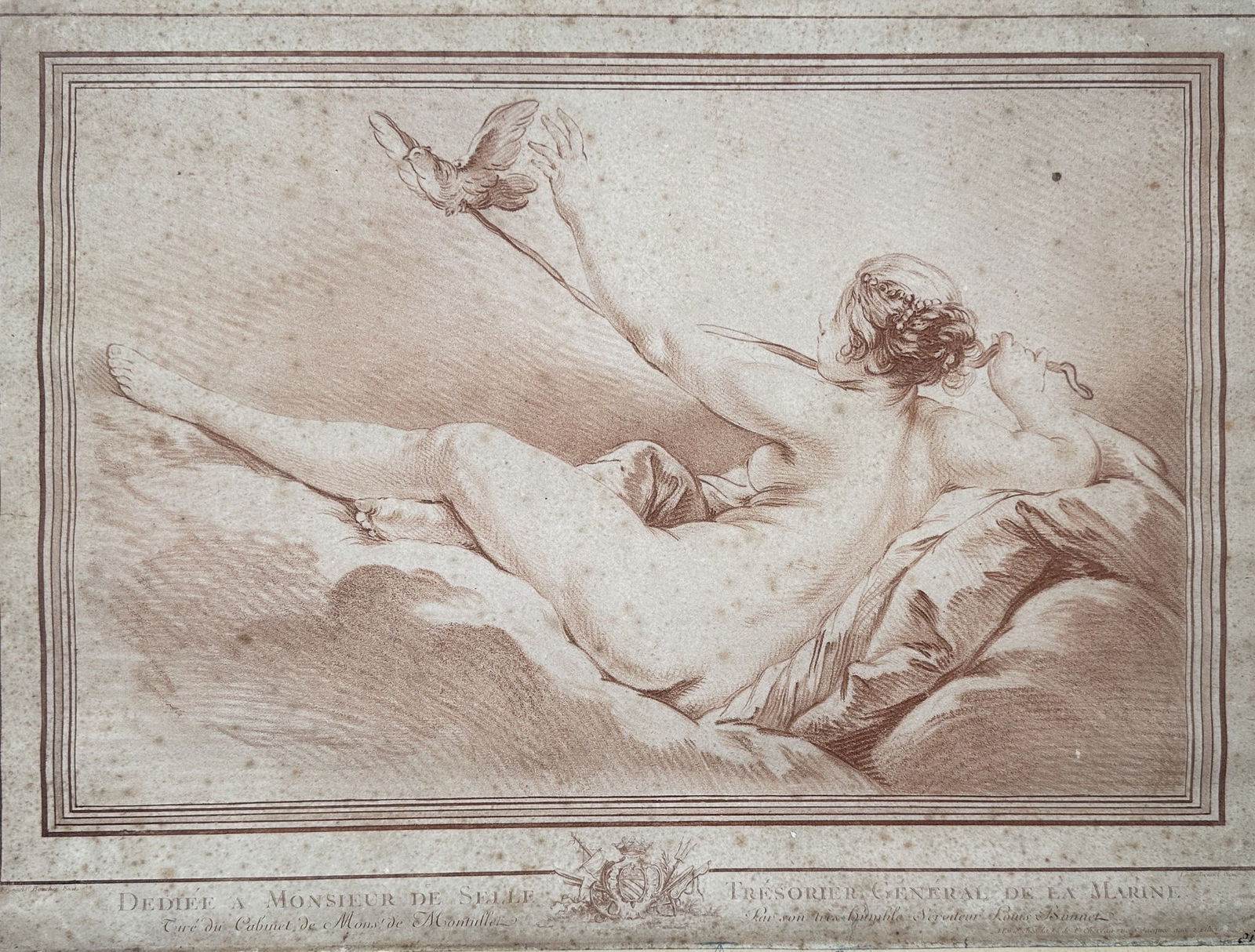 François Boucher (1703–1770) – Reclining Nude with a Bird – Crayon-manner engrav: This elegant rococo engraving depicts a reclining female nude resting upon a bed of soft cushions and drapery. The figure is shown from behind in a graceful, twisting pose, reaching upward with her le