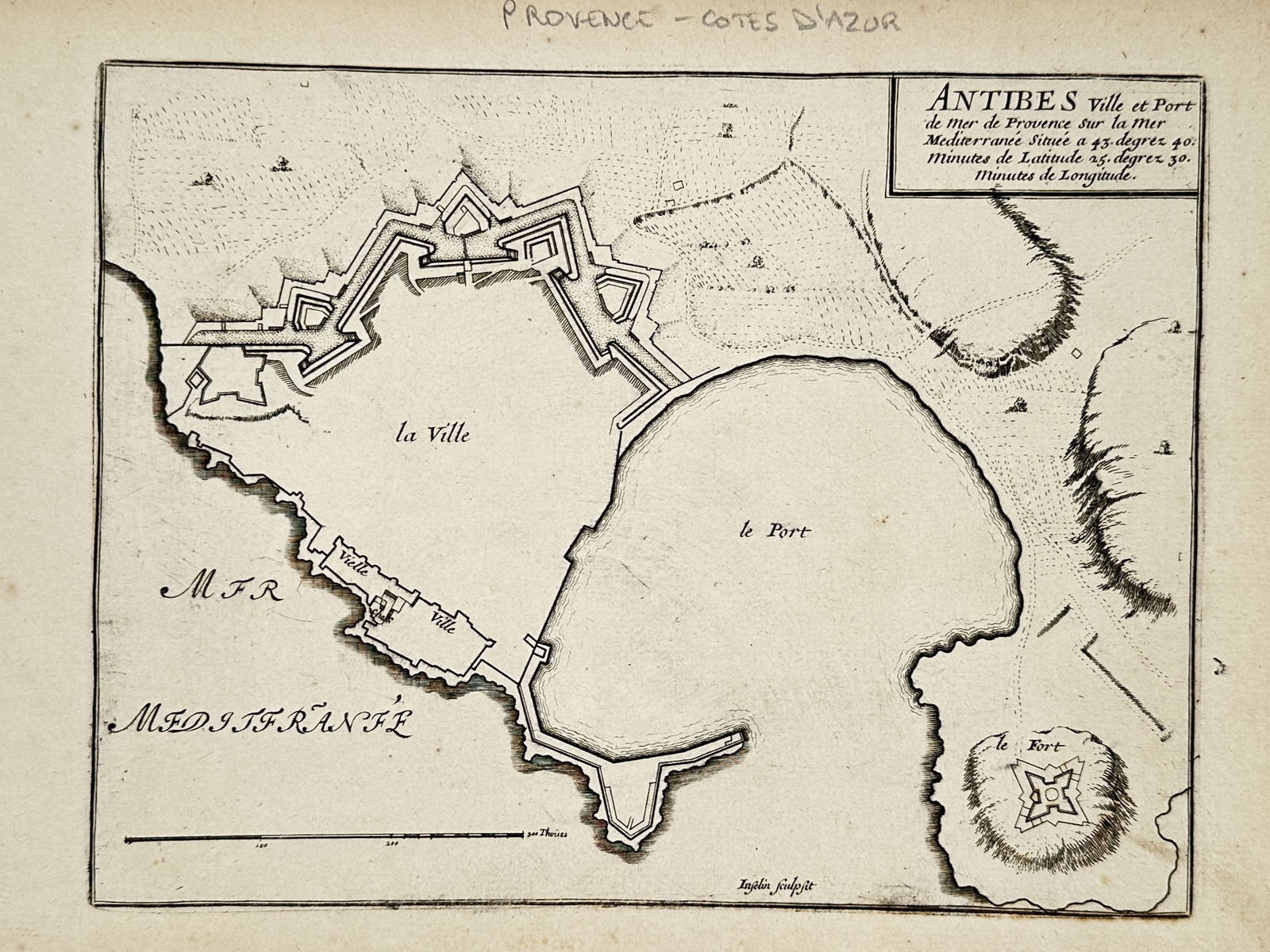 Nicolas De Fer (1646–1720) – Map of the City and Port of Antibes – France – Engraving (1705): "Antibes Ville et Port de Mer de Provence sur la Mer Mediterranée." This engraving presents a detailed topographical plan of the fortified city and harbor of Antibes on the French Mediterranean coast