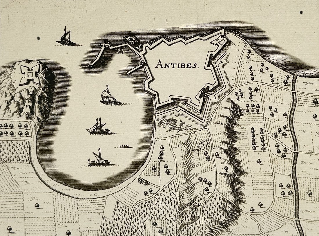 Nicolas Tassin (1600-1660) – Map of Antibes – France – Engraving (1634): "Antibes" This engraving presents a detailed seventeenth-century plan and bird's-eye view of the fortified town of Antibes on the Côte d'Azur in the Provence region of southeast France. The map empha