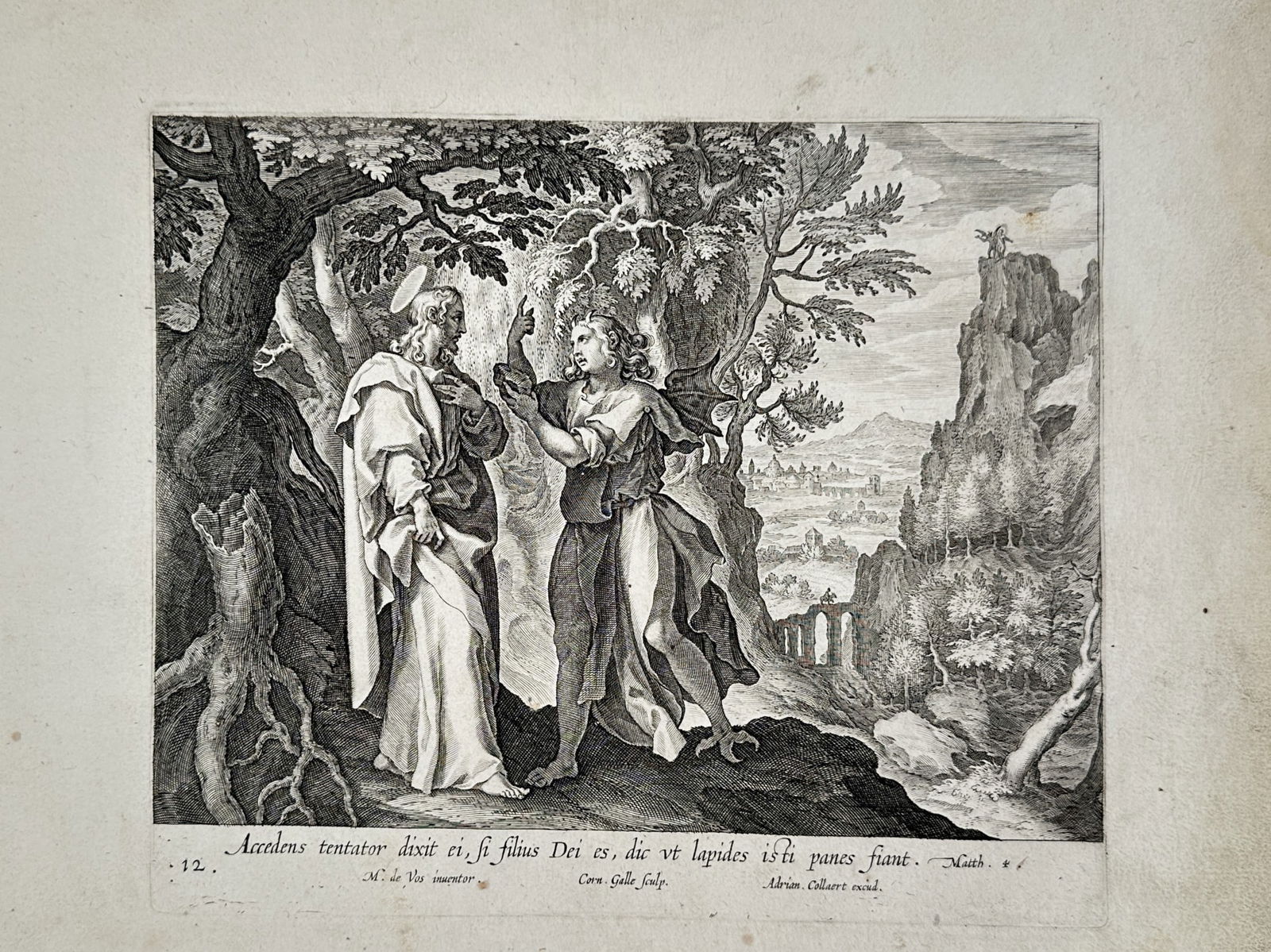 Adriaen Collaert (c. 1560–1618) – The Temptation of Christ – Engraving (17th Century): "Accedens tentator dixit ei, si filius Dri es, dic vt lapides isti panes fiant" depicts the temptation of Christ by the devil in a dense, rocky forest setting. This engraving is part of a series illus