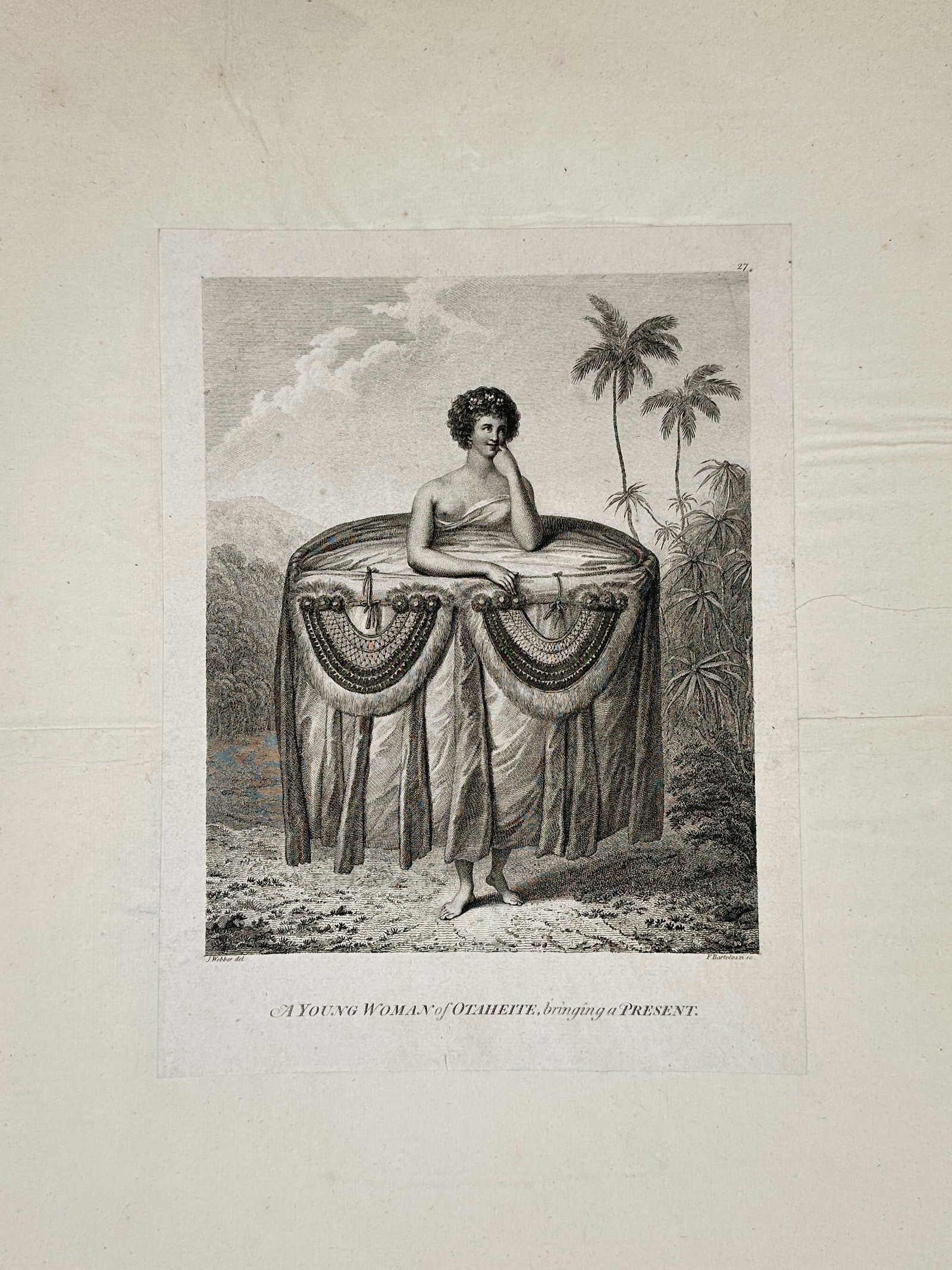 John Webber (1751-1793) – View of a young woman of Otaheite bringing a present: "A Young Woman of Otaheite, bringing a Present" This engraving illustrates a Tahitian woman standing in a tropical landscape with palm trees, wearing an immense and decorative wrap of bark cloth or ta