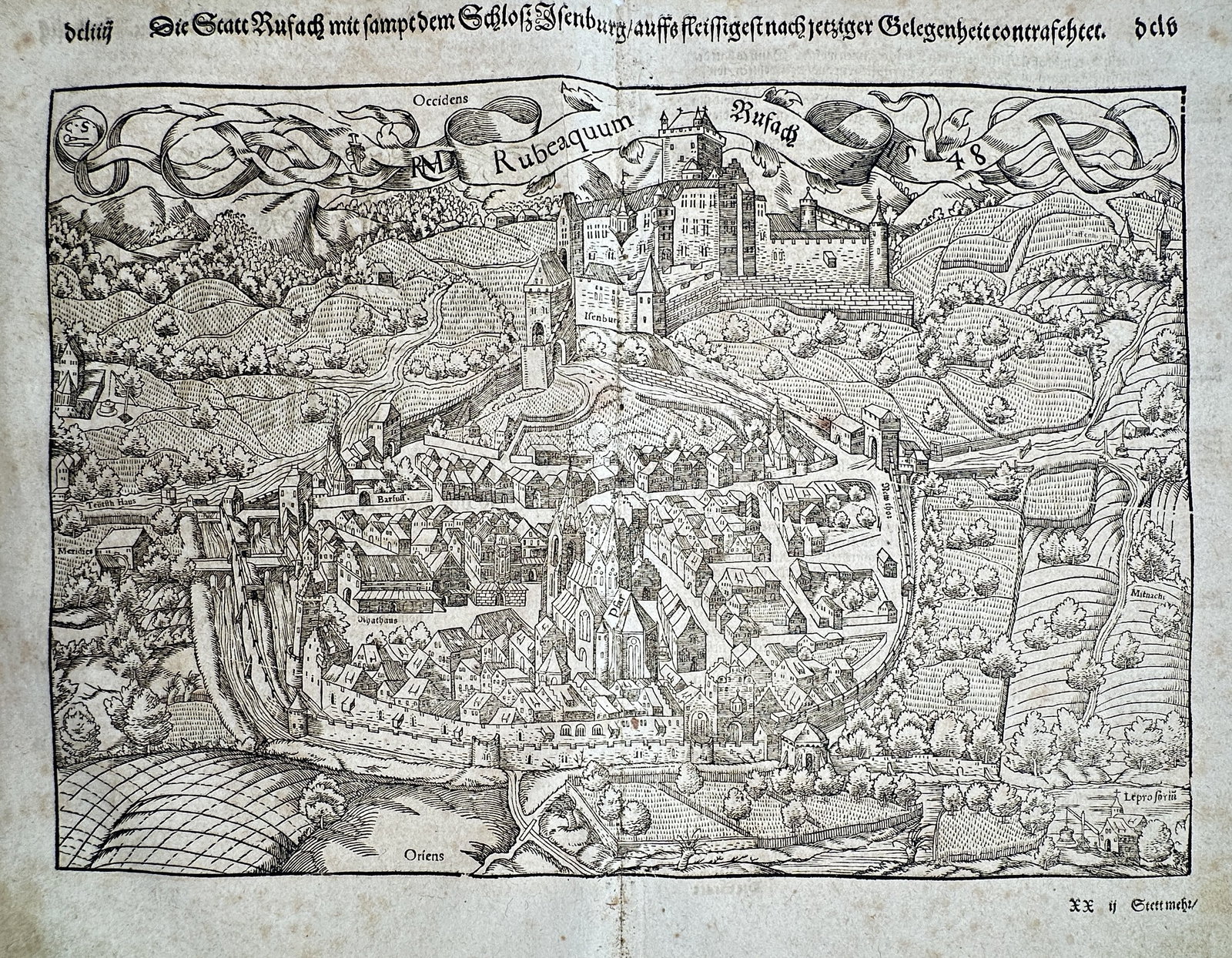 Sebastian Münster (1488–1552) – View of Rouffach and Isenbourg Castle – France – Woodcu: "Die Statt Rufach mit sampt dem Schloß Isenburg" This woodcut presents a detailed bird's-eye view of the city of Rouffach in Alsace, dominated by the Isenbourg Castle on the hill above the town. It w