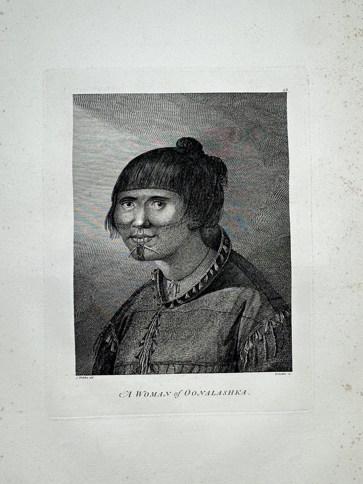 John Webber (1751–1793) – Portrait of a Woman of Oonalashka – Engraving (1784): "A Woman of Oonalashka" This engraving depicts an indigenous Unangan (Aleut) woman from Unalaska Island, featuring traditional chin tattoos and a septum piercing, and was published in the official acc