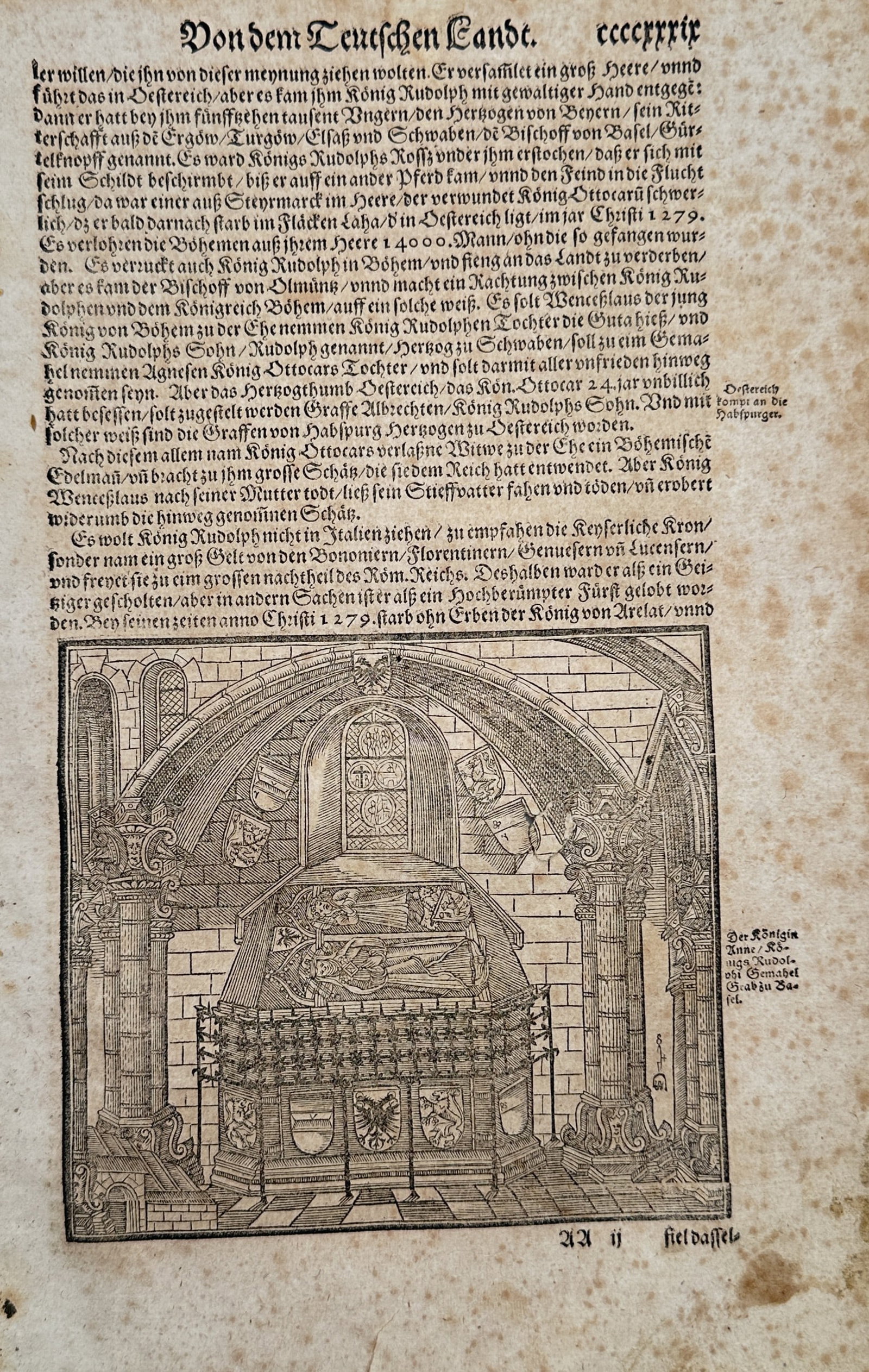 Sebastian Munster (1488-1552) – View of the Tomb of Queen Gertrude of Hohenberg – Woodcut: "Von dem Teutschen Lande" illustrates a monumental woodcut of a royal tomb located within a vaulted gothic interior. The scene depicts the elaborate sarcophagus of Gertrude of Hohenberg, the first wif