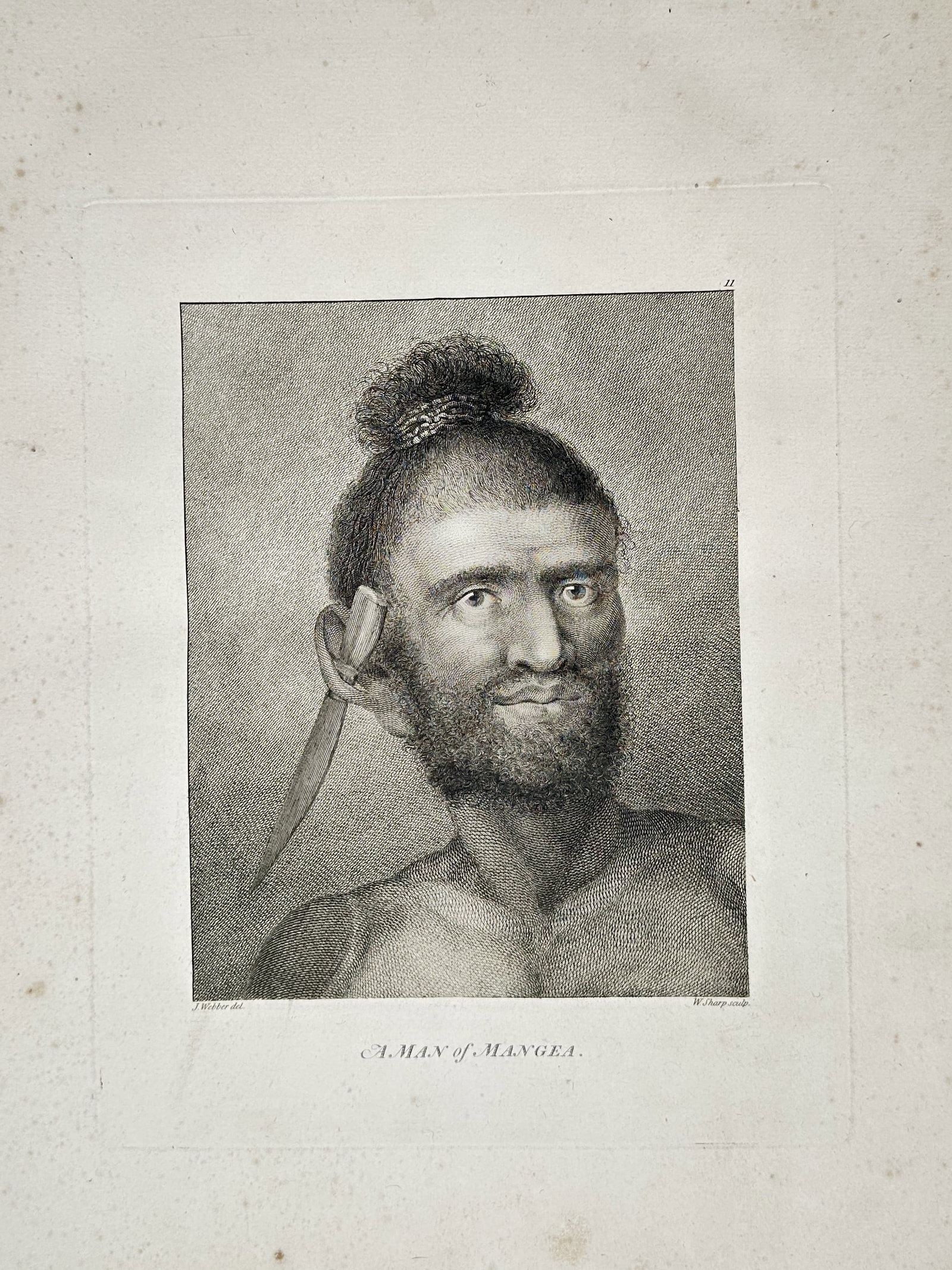John Webber (1751–1793) – Portrait of a Man of Mangea – Engraving (1784): "A Man of Mangea". This engraving depicts a portrait of a Mangaian man from the Cook Islands, capturing his specific hairstyle, beard, and a distinctive ornament tucked behind his ear. The work was pu