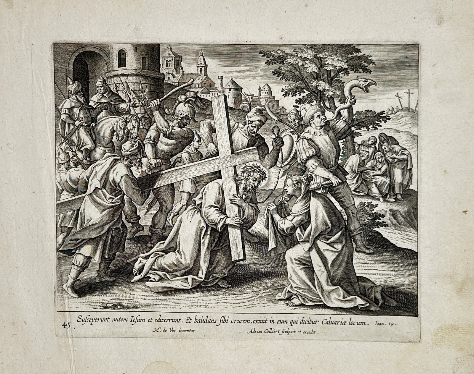 Maarten de Vos (1532–1603) – View of Christ Carrying the Cross – Netherlands – Engraving: "Susceperunt autem Iesum et eduxerunt" depicts Christ stumbling under the weight of the cross on the road to Calvary. The scene is populated by Roman soldiers and onlookers, with Saint Veronica kneeli