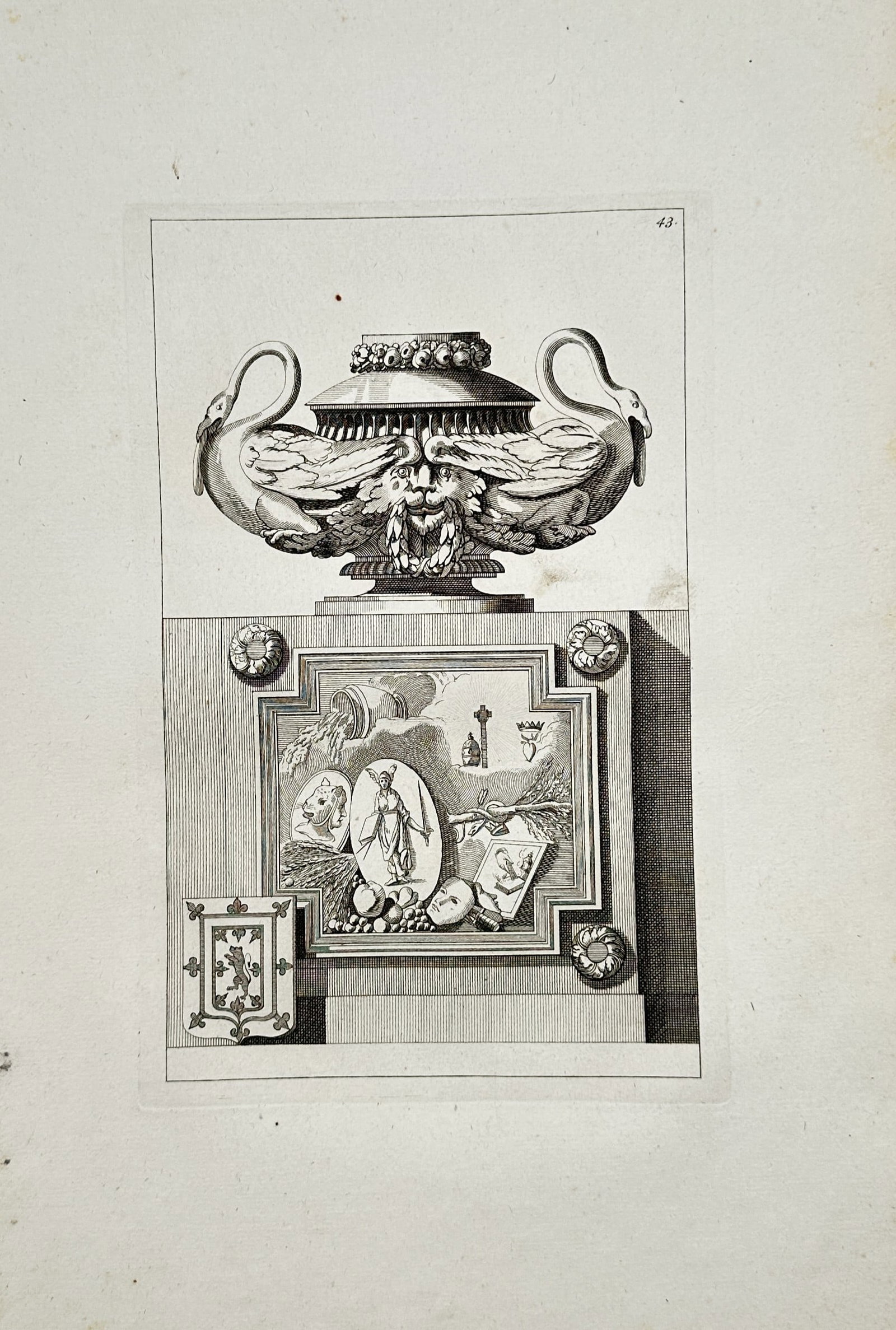 Jean-Charles Delafosse – Classical Vase with Swans and Base – Engraving (18th Century): "Vase Classique avec Cygnes et Piédestal" presents a broad overview of an ornamental classical vessel adorned with sculpted swans and a central mask resting atop an architectural block featuring alle