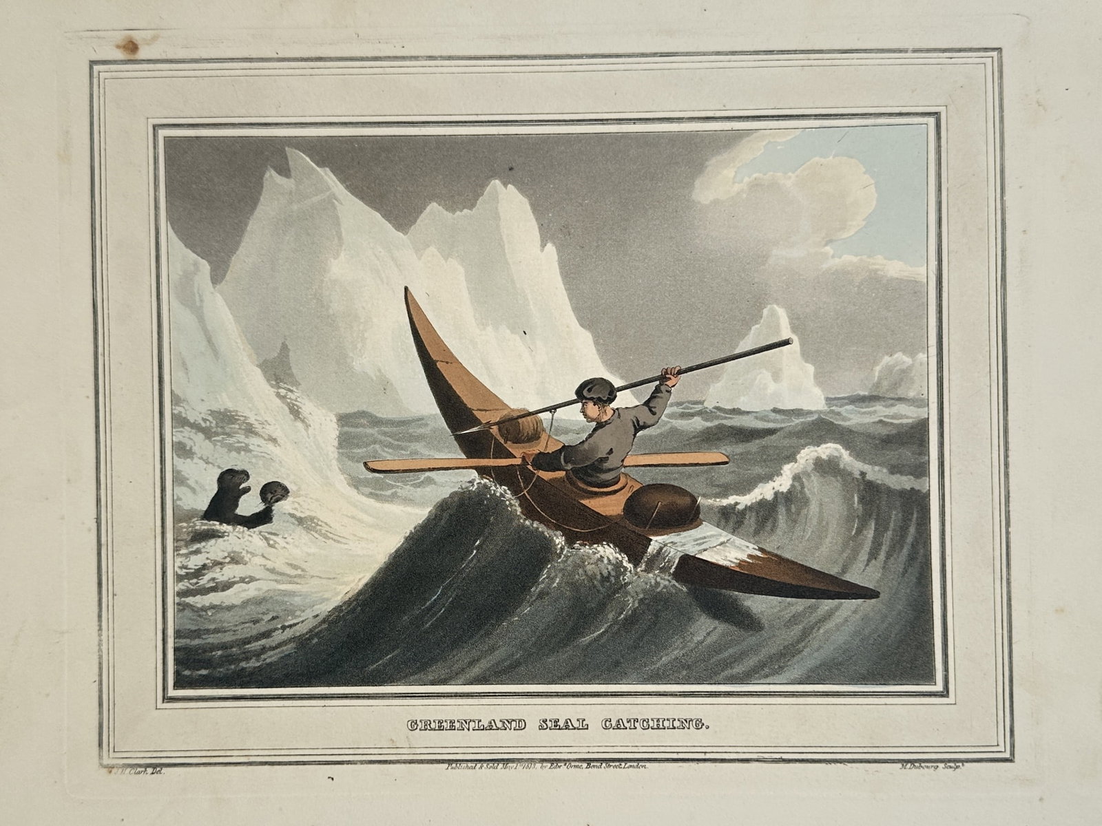 John Heaviside Clark – Greenland Seal Catching – Hand-coloured aquatint (1813): "Greenland Seal Catching" presents a dramatic and atmospheric maritime scene depicting an indigenous hunter in a kayak masterfully navigating rough, turbulent Arctic waters. The powerful composition s