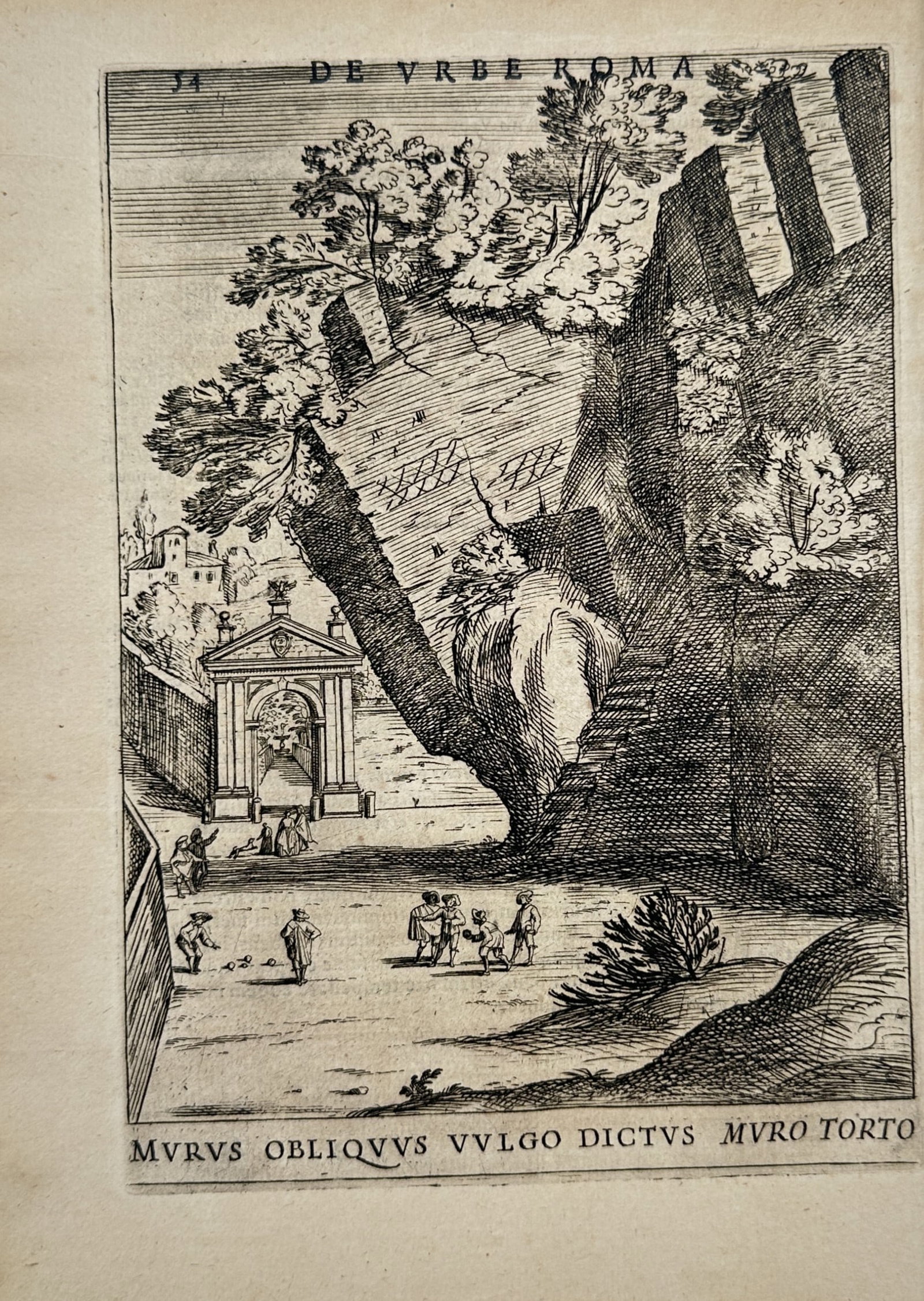 Alessandro Donati – Oblique Wall Commonly Called Muro Torto – Engraving (17th Century): "Oblique Wall Commonly Called Muro Torto" presents an architectural view depicting an ancient leaning stone wall structure surrounded by figures and greenery in Rome. The print serves an educational a
