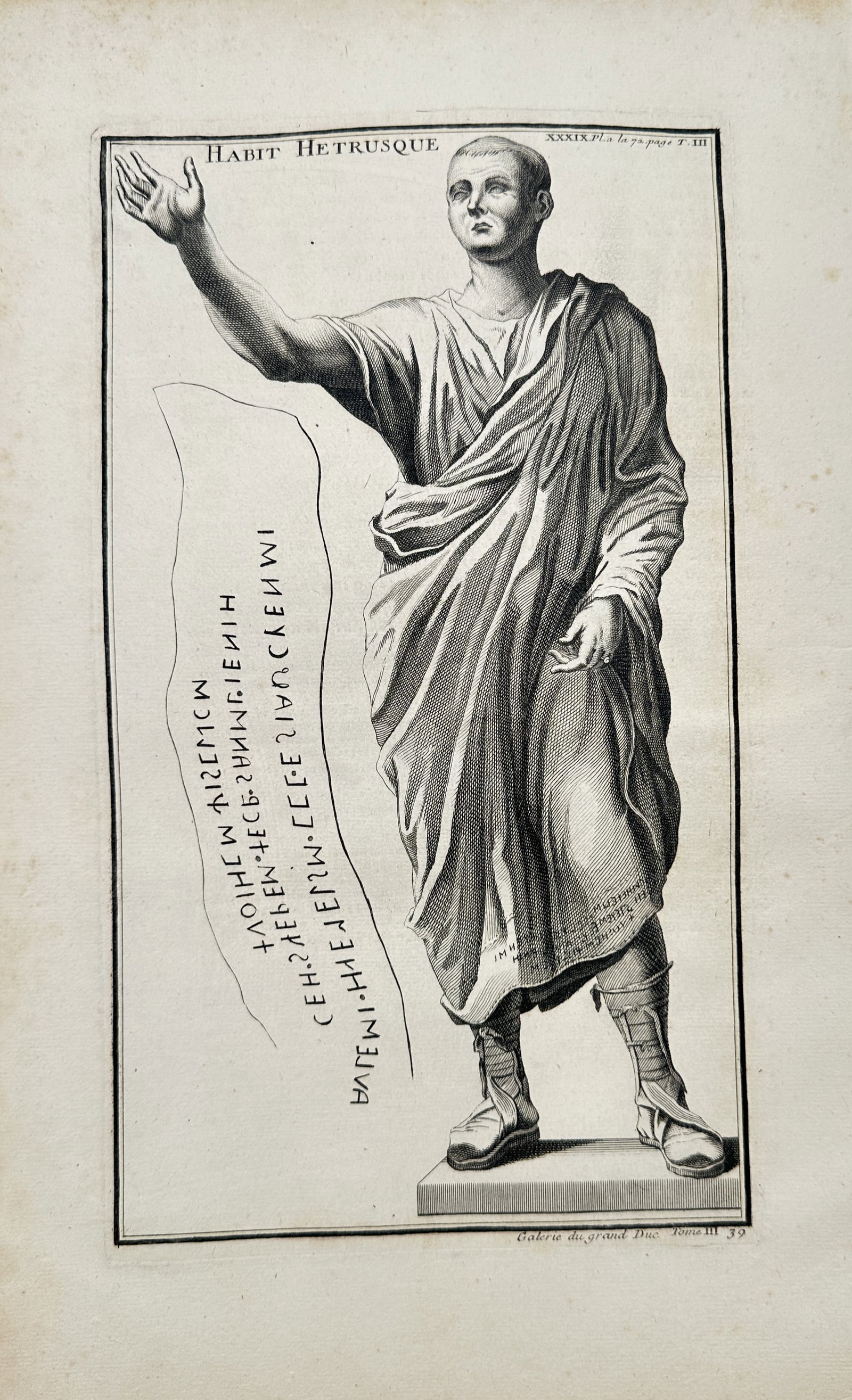 Bernard de Montfaucon – Etruscan Dress – Engraving (18th Century): "Etruscan Dress" presents an archaeological study illustrating the life-sized bronze statue of the Etruscan-Roman orator Aulus Metellus, known as L'Arringatore, wearing a draped toga and boots alongsi