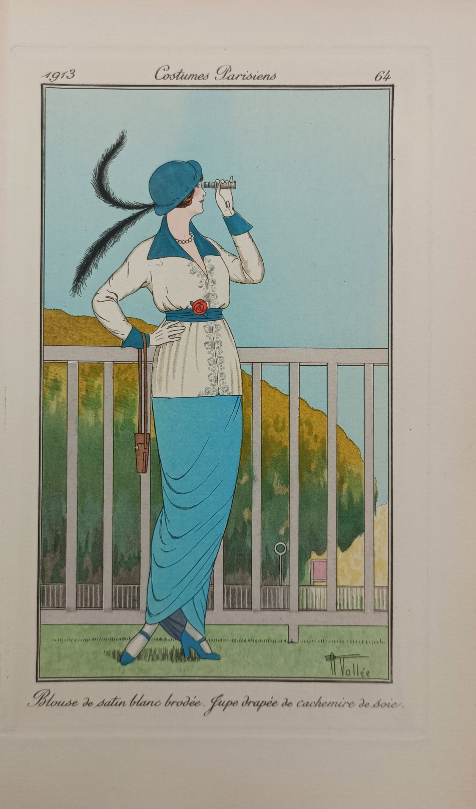 Armand Vallée – Embroidered White Satin Blouse and Draped Silk Cashmere Skirt – Pochoir Print: "Embroidered White Satin Blouse, Draped Silk Cashmere Skirt" depicts an elegant fashion illustration of a fashionable woman looking through a monocular at an outdoor balustrade, published in Paris for