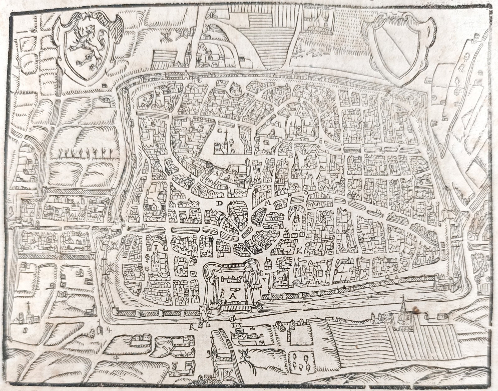 Sebastian Münster – Map of Utrecht – Netherlands – Woodcut (16th Century): "The Episcopal City of Utrecht" presents an early cartographic and topographical plan delineating the fortified city of Utrecht with its defensive moats, walls, gates, and dense urban street network. 