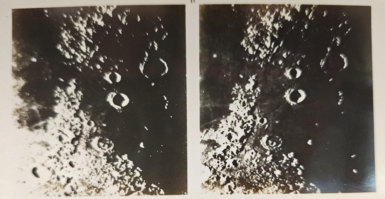 Unknown Artist – Stereoscopic Study of Lunar Craters – Lithograph (20th Century): "Stereoscopic View of the Lunar Craters and Mountainous Surface" presents a twentieth-century astronomical visualization featuring a dual stereoscopic study of rugged impact craters and shadowed highl