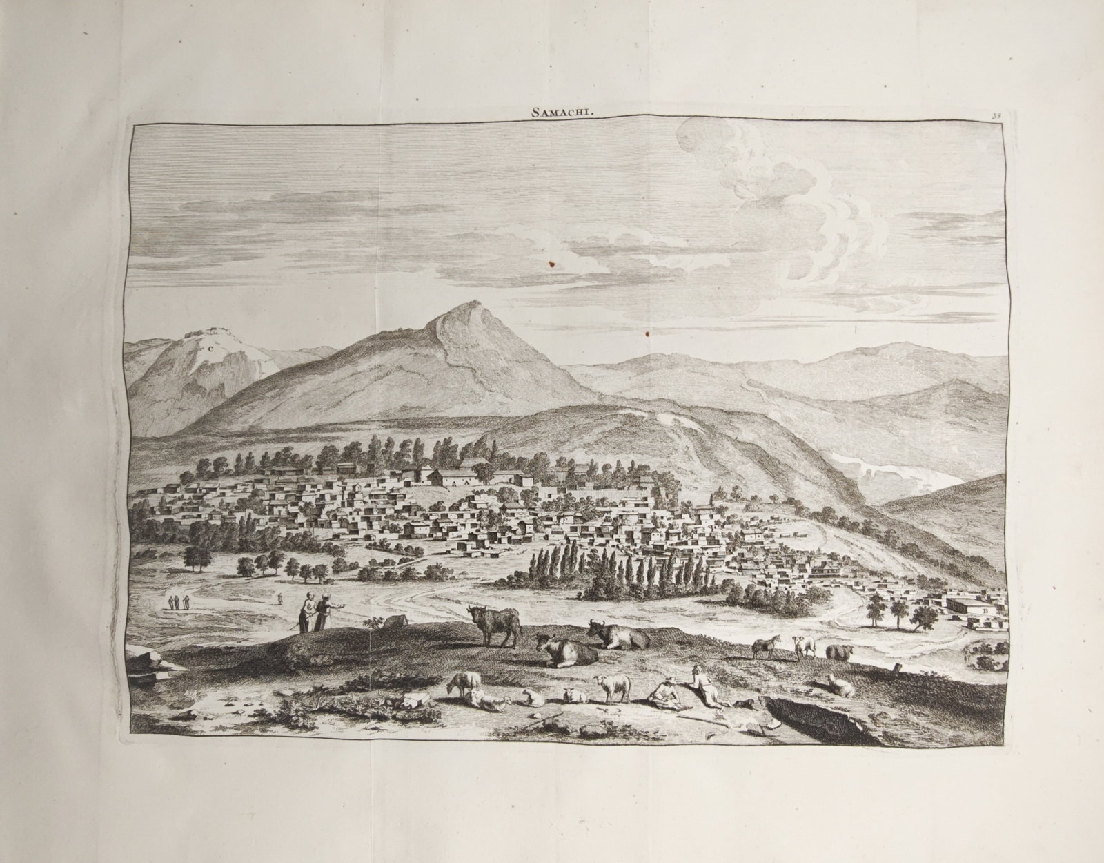 Cornelis de Bruyn – View of Shamakhi – Engraving (1718): "View of Shamakhi" presents an expansive topographical study illustrating the historic settlement nestled against dramatic mountain peaks, with figures, grazing cattle, and sheep occupying pastoral te