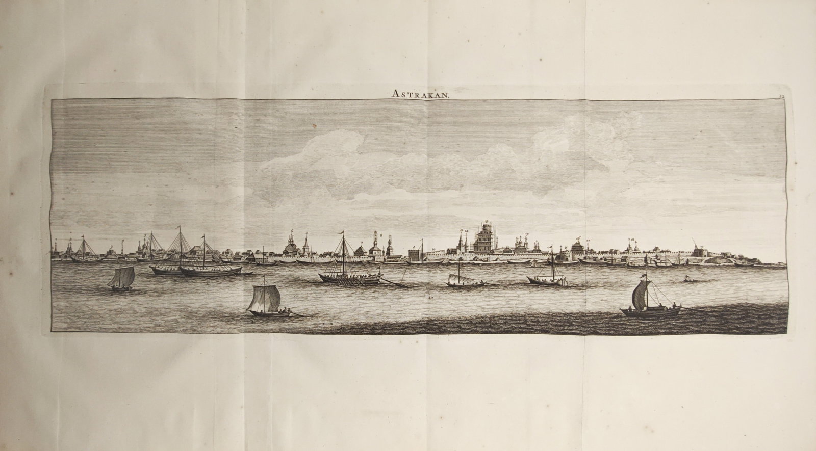 Cornelis de Bruyn – View of Astrakhan – Engraving (1718): "Astrakhan" presents an expansive panoramic topographical and maritime study illustrating the historic fortified port city and its prominent architectural skyline along the Volga River with various sa