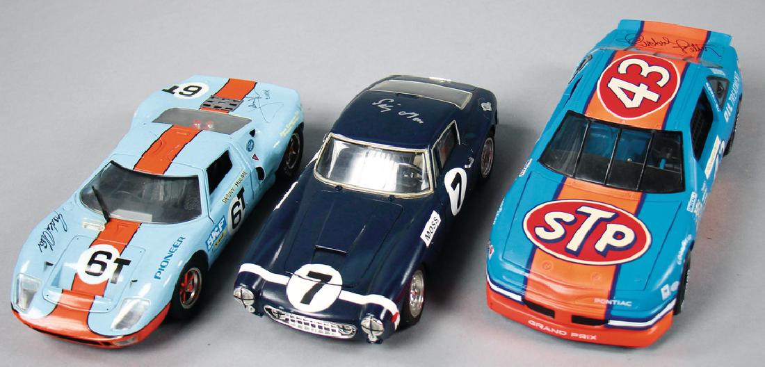 3 model cars, signed by Moss, Jackie Oliver, Johnny (1 of 1)