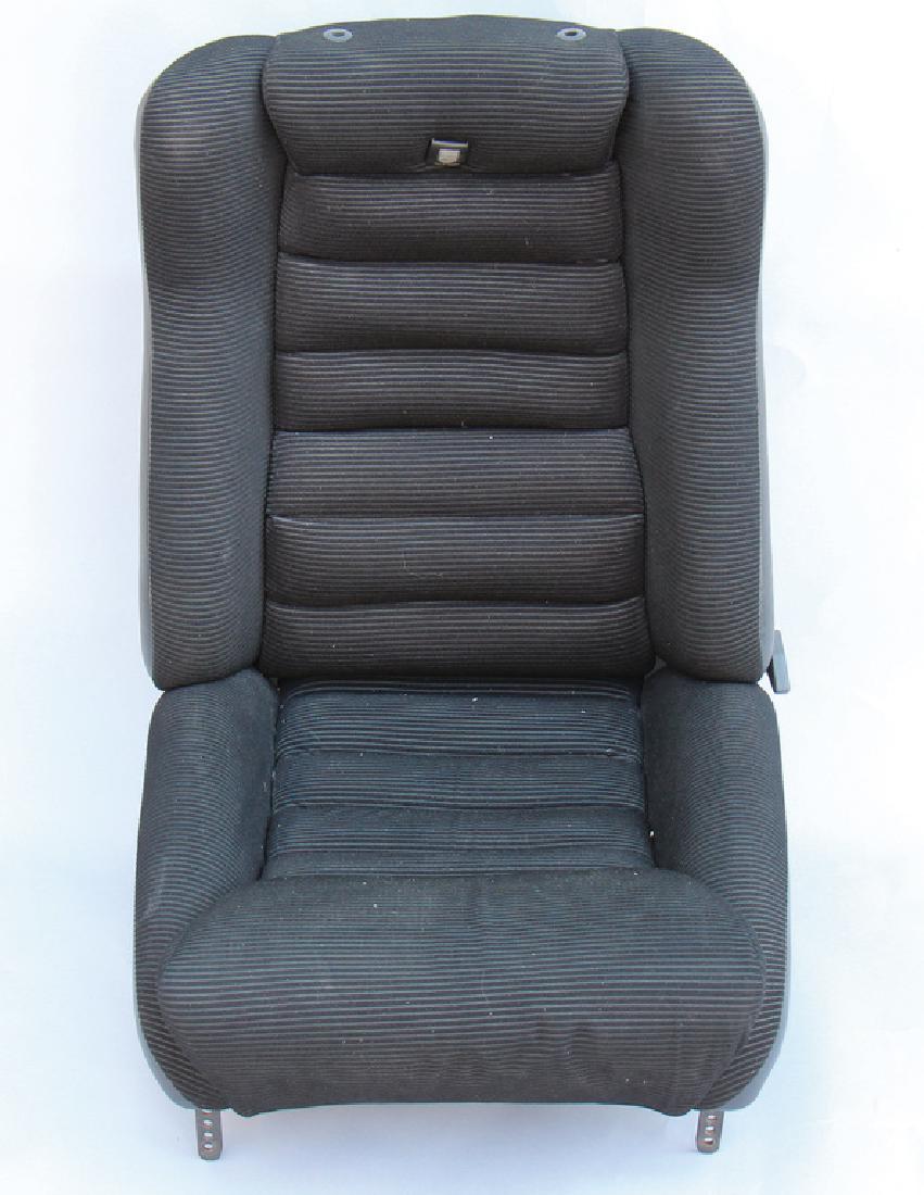 PORSCHE Scheel sport seat for Porsche 911 F-model from: PORSCHE Scheel sport seat for Porsche 911 F-model from the '70s, without headrest, with high cheeks, black fabric, in good condition German Description PORSCHE Scheel Sportsitz für Porsche 911 F-Mode