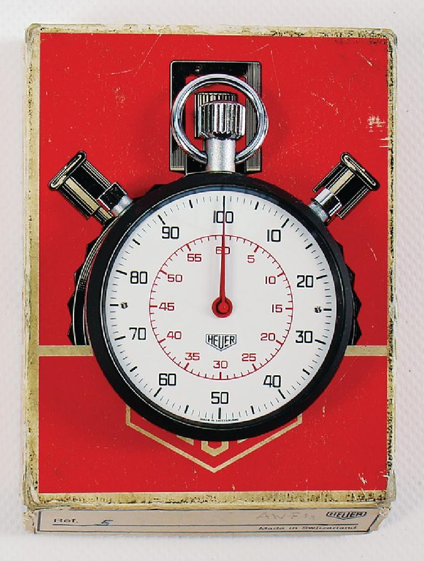HEUER stopwatch from Heuer, with a diameter of 6cm, in: HEUER stopwatch from Heuer, with a diameter of 6cm, in original box, with slight traces of usage, otherwise good condition German Description Heuer Stoppuhr von Heuer, Durchmesser 6cm, in Originalbox,