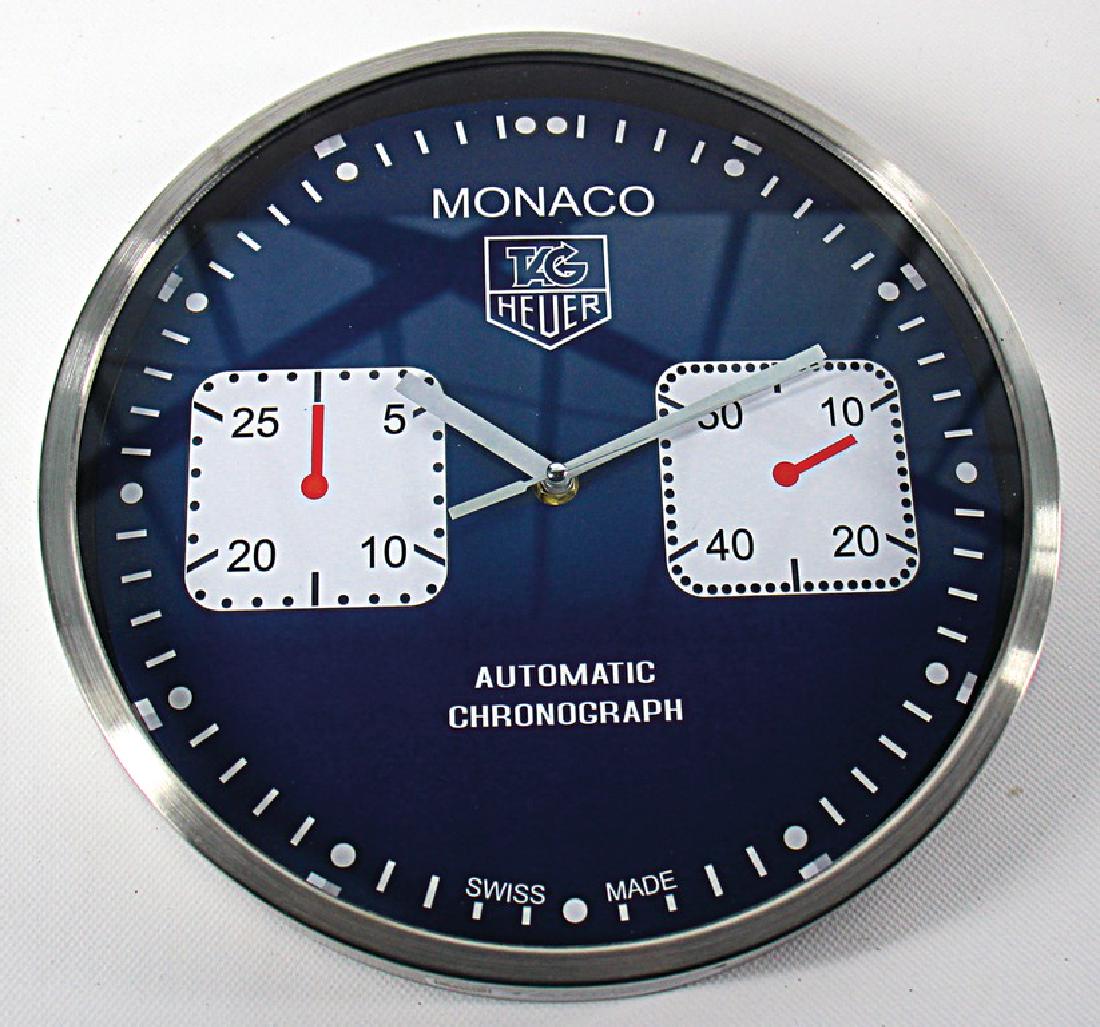 HEUER dealer wall clock "TAG HEUER MONACO", with a May 04, 2019