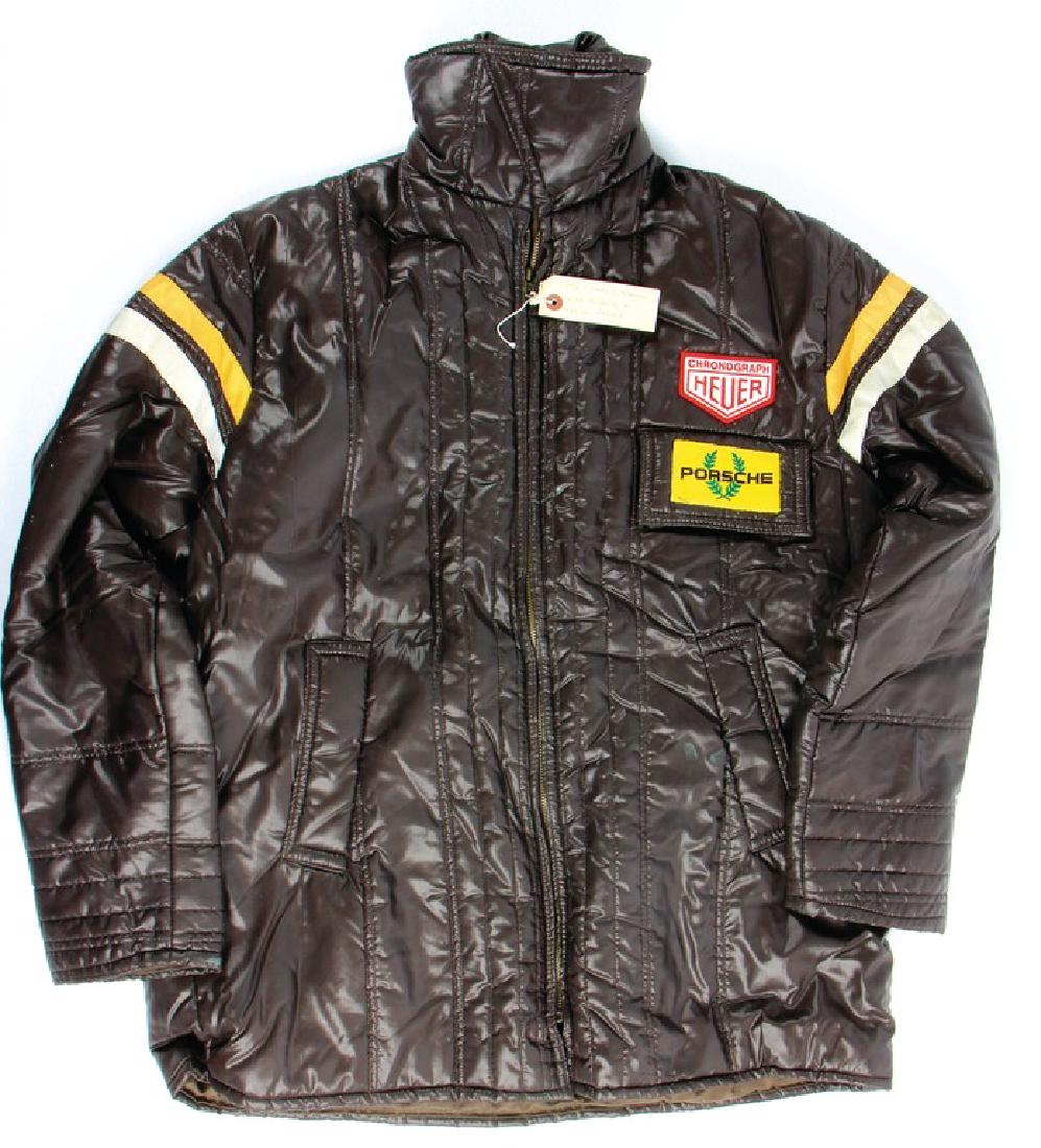PORSCHE '70s rallye jacket with Porsche and Heuer: PORSCHE '70s rallye jacket with Porsche and Heuer patches on the left side of the breast, color: brown, size L, worn, but in good condition, very rare German Description PORSCHE 70er Jahre Rallyejacke
